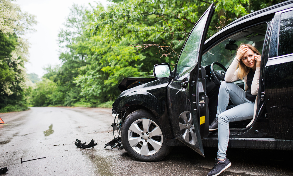 Woman calling after a car accident