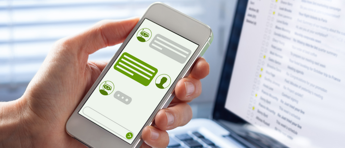 Person looking at phone with autoresponders