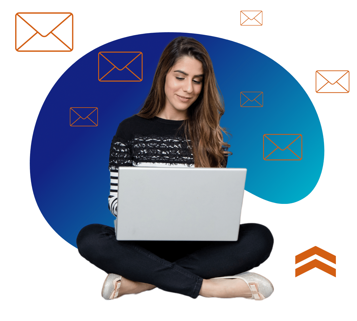 woman sitting cross-legged typing on her laptop
